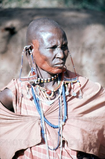 The elaborate beadwork of this Masai woman indicates her ethnic identity, social status, and the number and status of her children