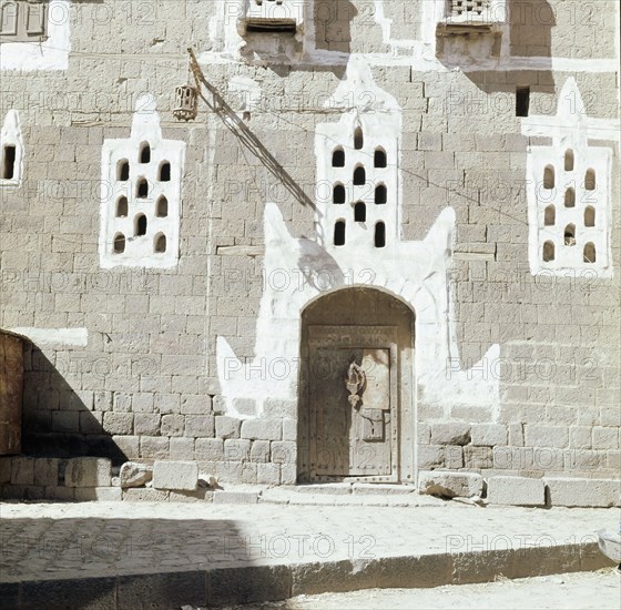 The doorway of an old multi-storied house in San'a