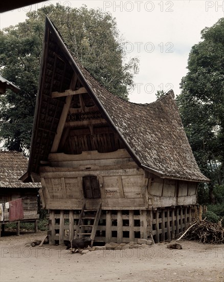 The three-level structure of Toba Batak houses corresponds to ideas of the cosmos