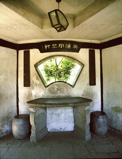 Fan-shaped window in the Fan Pavilion at the Shizilin Garden