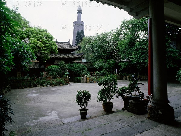 The courtyard and minaret of the Memorial Mosque to the Prophet, the Huai Sheng Si, more usually known as Beacon Tower Mosque, where the Islamic minaret rises above the roof-line of traditional Chinese architecture