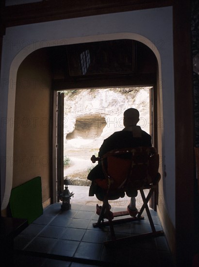 The abbot of Zuisen-ji sitting in quiet contemplation of the temple gardens