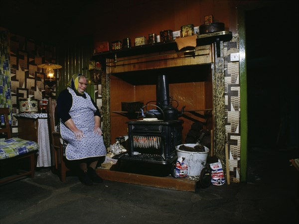 Croft interior lit by paraffin lamp, Flotta