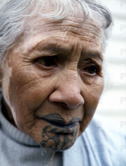 An elderly Maori woman, reputed to be the last survivor with facial tattooing