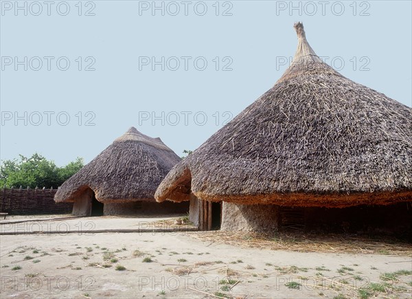 Replica crannog by the lake at Graggaunowen