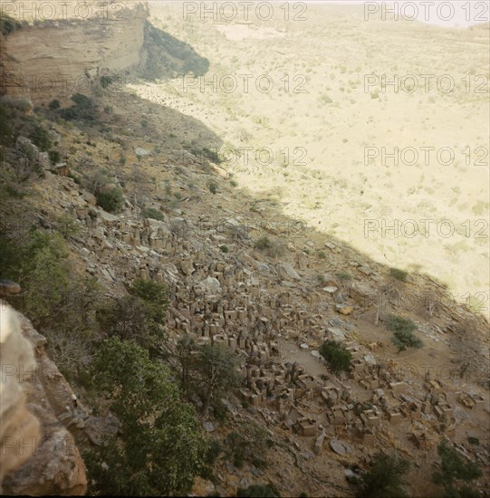 A Dogon village at the foot of the Bandiagara cliffs