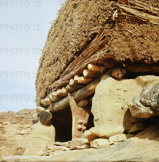 Aligned to the four cardinal points and roofed by a thick layer of millet stalks, the men's house or Togu Na, is the focal point of male society in every Dogon village