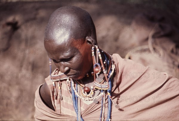 The elaborate beadwork of this Masai woman indicates her ethnic identity, social status, and the number and status of her children