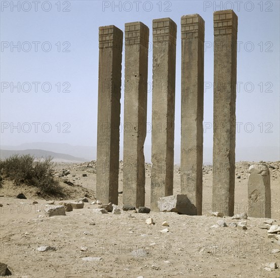 Five pillars still standing on the site of the Baran Temple, near the ancient city of Marib