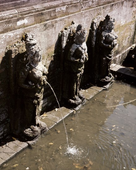 Heavenly nymphs spout water at the sacred baths of the Goa Gajah, Elephant Cave