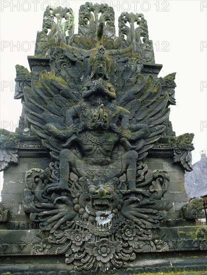 Vishnu (Wisnu) on his mount Garuda from the Pura Sada temple, Desa Kapal