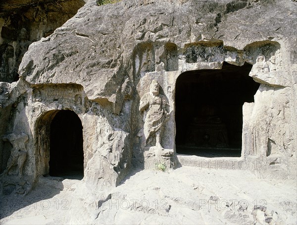 The Longmen cave-temple complex which extends for about 1000m along the Yi River