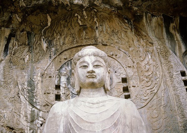 The colossal 17 metre high image of Vairocana Buddha in the Fengxian temple at the Longmen cave temples