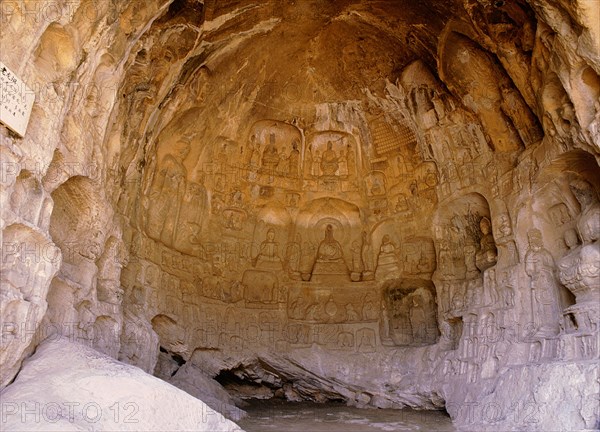 The Longmen cave-temple complex which extends for about 1000m along the Yi River