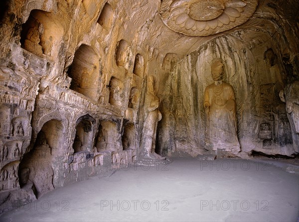 The Longmen cave-temple complex which extends for about 1000m along the Yi River