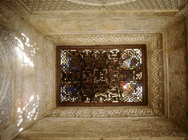 The stucco decoration above the windows in the Mirador de Lindaraja