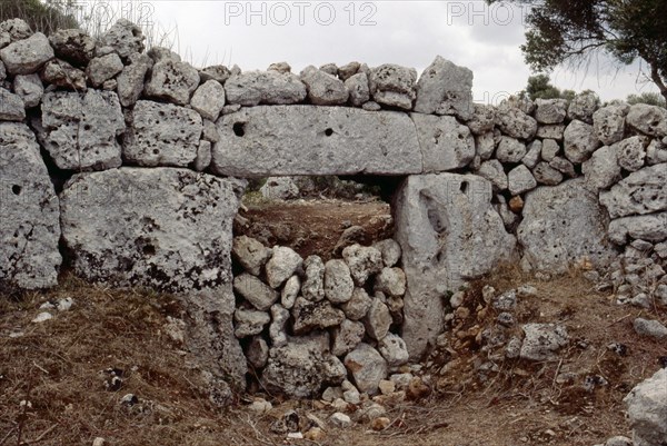 Monumental megalithic gateway set in the great wall at the fortified megalithic site of Son Catlar Spain