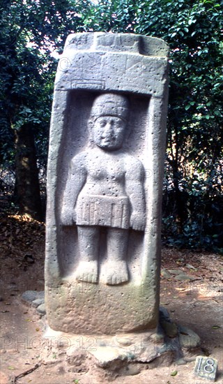 Carved stone stela of Olmec figure, possibly a woman, now displayed in the archaeological park at Villahermosa, Veracruz, Mexico