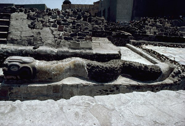 Feather Serpent (Quetzalcoatl) detail, showing the stone head and composite body with partial plaster covering