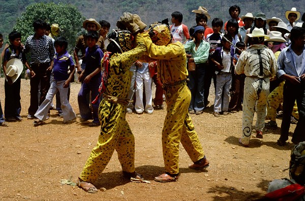 Men dressed as jaguars in a fertility and rain-making festival dating from the pre-Columbian times