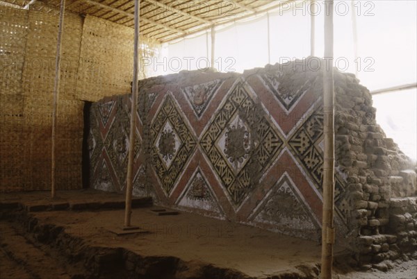 'Huaca de la Luna' outside Trujillo, north coast of Peru, showing polychrome clay freize with heads of the 'Fanged Deity', a decapitator god associated with human sacrifice