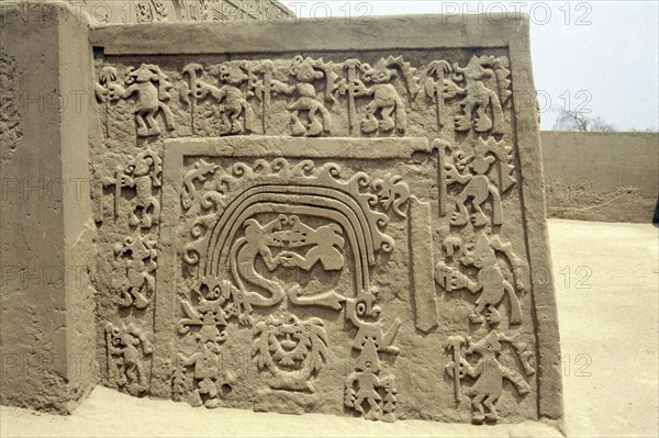 'Huaca del Dragon' outside Trujillo, north coast of Peru, showing detai lof ceremonial platform decorated with clay frieze of maritime motifs, including the distinctive 'double-headed dragon wave' motif