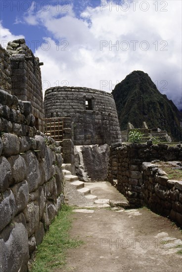 View of the Inca street leading to the circular "Torreon" or astronomical observatory