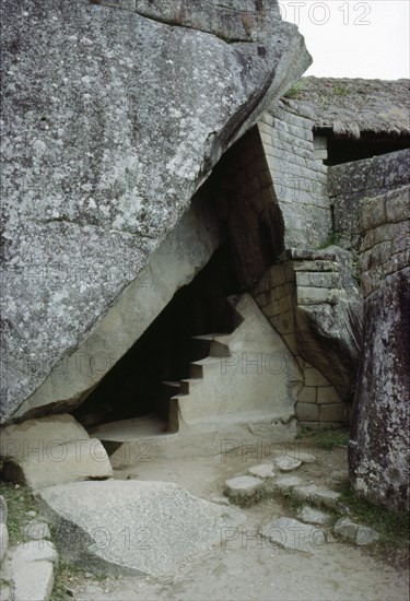 The "Royal Tomb" beneath the Temple of the Sun at Machu Picchu shows a mixture of living rock, Inca walling and Inca stone carving