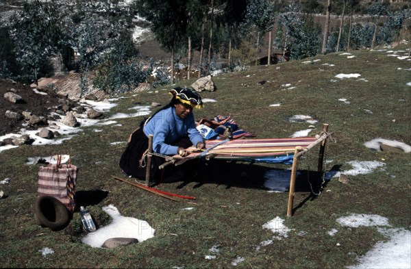 Quechua 'Inca' woman weaving on a horizontal single-heddle loom