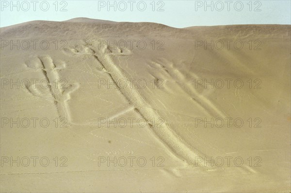 The so-called "Candelabra" or "Trident" design, etched onto the sand and overlooking the Pacific Ocean at Paracas