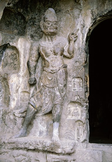 The Longmen cave-temple complex which extends for about 1000m along the Yi River