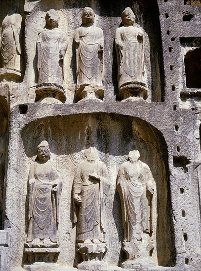 The Longmen cave-temple complex which extends for about 1000m along the Yi River