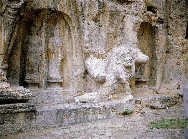 The Longmen cave-temple complex which extends for about 1000m along the Yi River