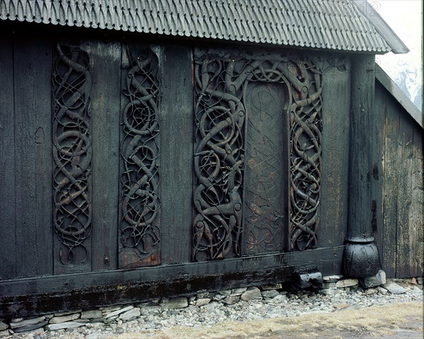 Carving on the side of the stave church at Urnes