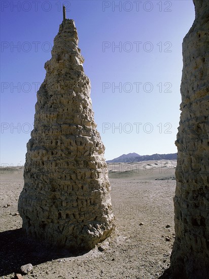 Dagodas near the site of the Mogao Caves, also known as the Thousand Buddha (Quinfodong) Caves, Dunhuang