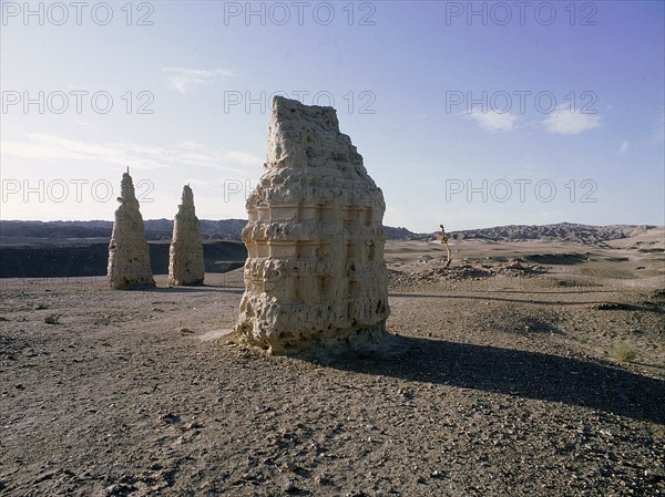 Dagodas near the site of the Mogao Caves, also known as the Thousand Buddha (Quinfodong) Caves, Dunhuang