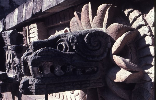 Side view of a coloured Quetzalcoatl carved head, from the pyramid of Quetzalcoatl