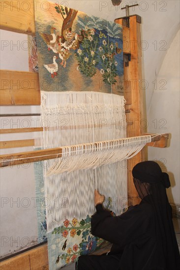 Soraia Hassan, a weaver at the Ramses Wissa Wassef Art Centre and her loom