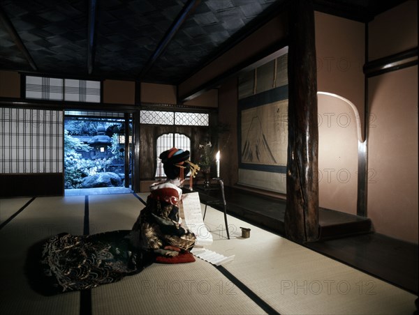 Geisha reading in the Shimabara district of Kyoto, one of Japan's earliest pleasure quarters which opened in the time of Hideyoshi Toyotomi