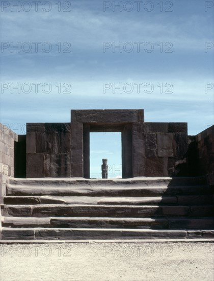 View across the "Semi-subterranean temple" to the monolithic doorway to the Kalasasaya enclosure, Tiahuanaco