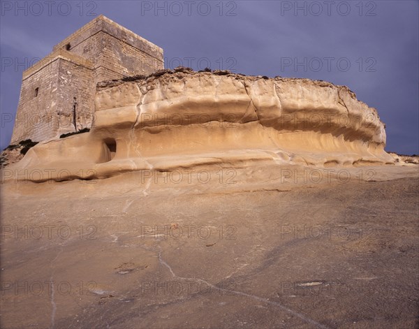 Watch tower at Xlendi and limestone formations