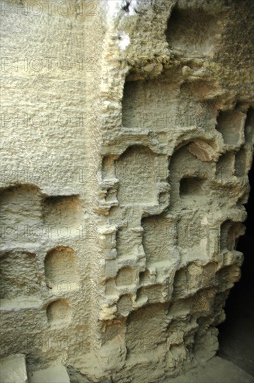 The Serapeum is a system of underground galleries hewn out of solid rock with large side chambers where the mummified remains of the sacred bulls of Apis were held in sarcophagi