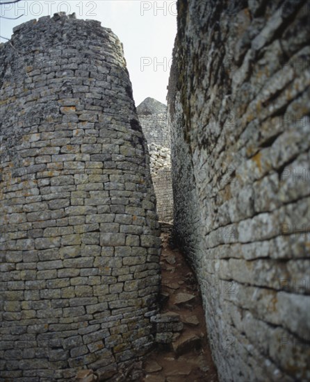 Path between the enclosure wall and the conical tower from great Zimbabwe