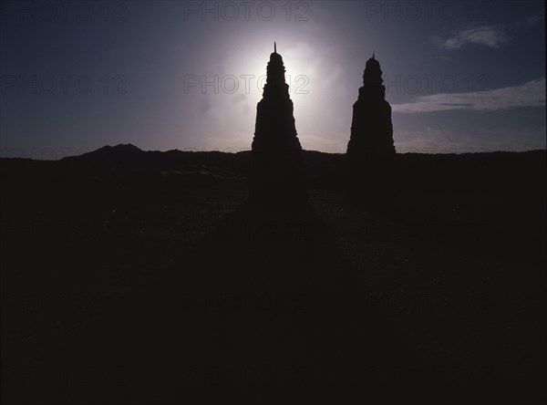 Dagodas near the site of the Mogao Caves, also known as the Thousand Buddha (Quinfodong) Caves, Dunhuang