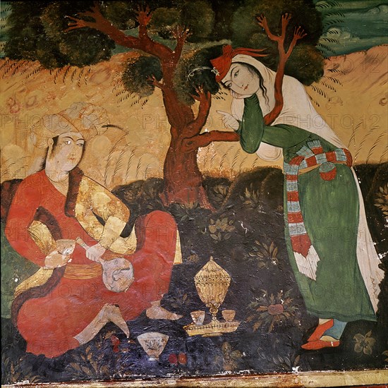 A wall painting in the Hall of One Hundred Pillars in Isfahan depicting a man and a girl taking refreshments in a garden