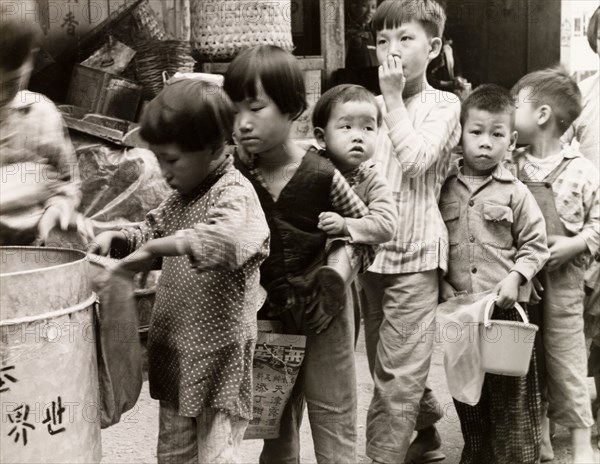 Children queuing for food, Hong Kong