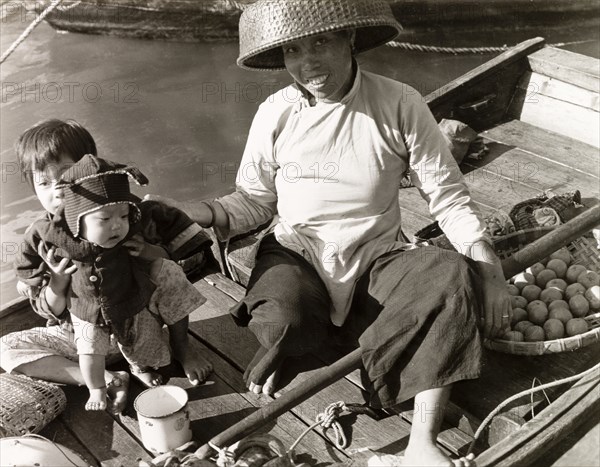 Selling fruit from a sampan