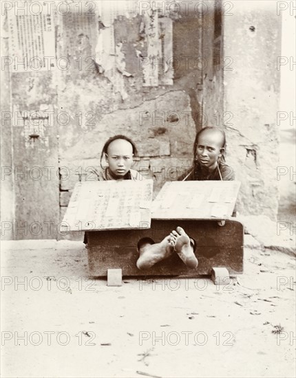 Petty criminals in the stocks, Hong Kong