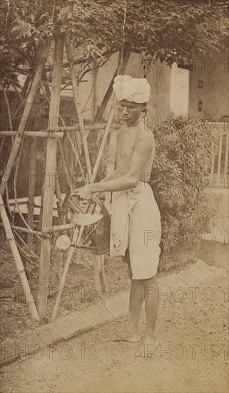 Watering the garden, India