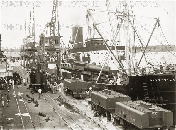 Steam engine lifted by crane from the SS Harmonides